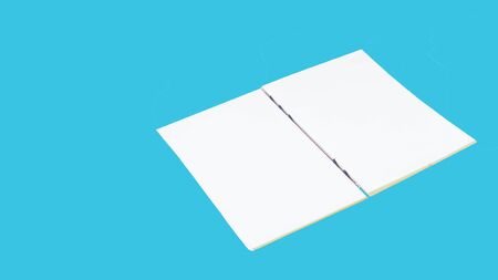 Mockup of opened blank book at white design paper background.の写真素材