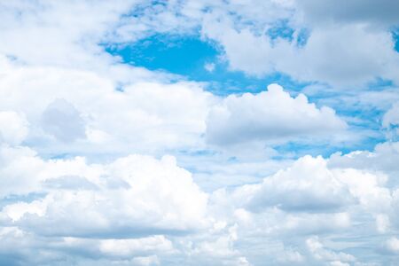 Blurred sky blur or azure sky and white cloud background, beautiful nature on summer. Cloudscape backgroundの写真素材