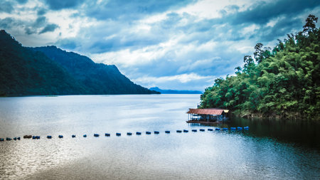 Mountains, lakes and the early morning fog .beautiful landscape in Kanchanaburi Thailand .