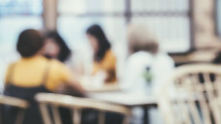 Blurred cafe interior. Abstract defocused background .cafe ( restaurant ) with light bright tone For modern lifestyle background. Business article backgroundの写真素材