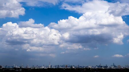city skyline. Buildings silhouette cityscape . Big city streets. Blue sky with sun and clouds. the beautiful skyline of Chongqing Bangkok Thailand . urban architectural landscape skyline .の写真素材
