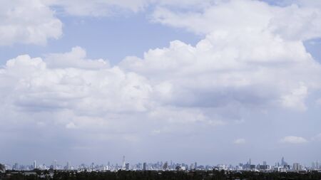 city skyline. Buildings silhouette cityscape . Big city streets. Blue sky with sun and clouds. the beautiful skyline of Chongqing Bangkok Thailand . urban architectural landscape skyline .の写真素材