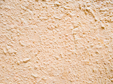 Abstract pink background texture concrete wall . the pink texture of the surface of the wall covered...