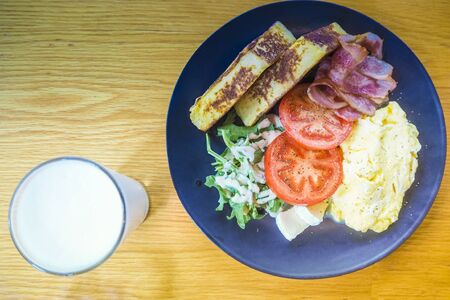 Fresh green pepper, onion and tomato give this savory omelet garden-fresh flavors. Healthy breakfast dish recipes healthy breakfast high proteinの写真素材