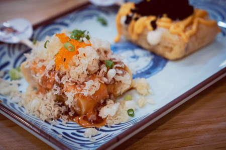 Tamagoyaki, Japanese sweet omelette, selective focus. Close up Japanese Cuisine, Sushi Set with egg, Tamagoyaki, nigirizu .の写真素材