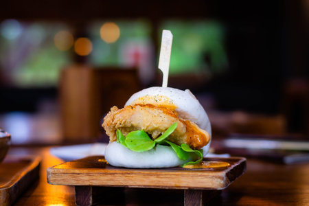 Selective focus Hirata Buns. Japanese traditional food. Asian cuisine made from steamed buns stuffed...