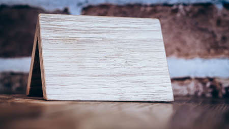 wooden Sign Board Reserve On The Restaurant Wood Table Background, Close Up, Concept Image,の写真素材