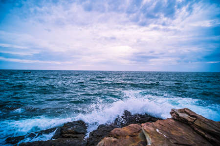 Sea with Smooth Wave and Rock landscape. Nature of Seascape in vacation holiday travel relax time.の写真素材