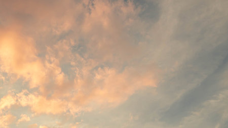 Dramatic clouds at sunset with cityscape silhouette. Abstract season weather vacation time.