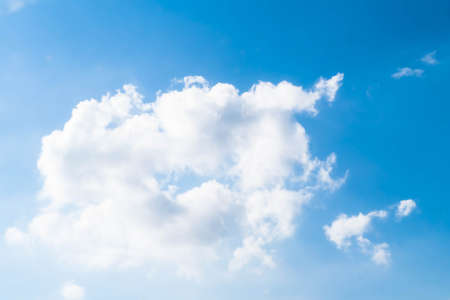 Beautiful white fluffys clouds sky background. Abstract season and weather environment.の写真素材