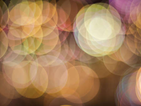 Colorful blur light hexagon bokeh background. Abstract Christmas festival defocused background.の写真素材