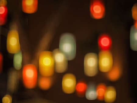 Colorful blur light hexagon bokeh background. Abstract Christmas festival defocused background.の写真素材