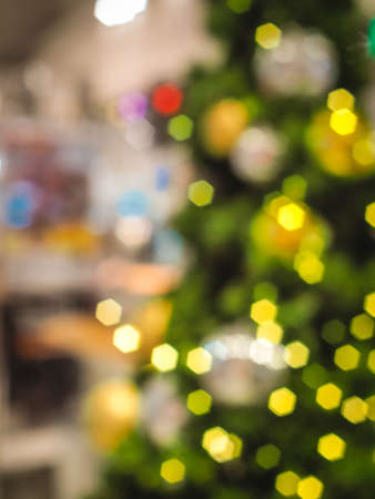 Colorful blur light hexagon bokeh background. Abstract Christmas festival defocused background.の写真素材