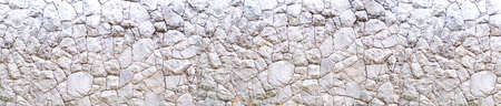 Panoramic Wide angle Slate stone wall textured background for mapping graphicの写真素材