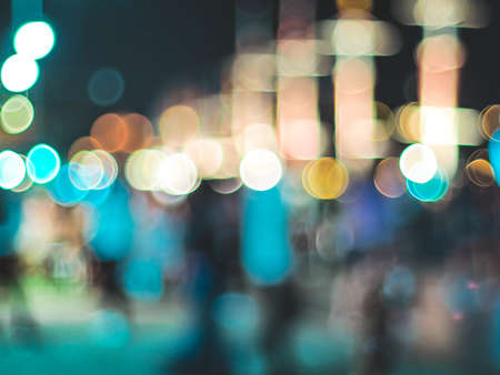 Bokeh city lights background. Bokeh of cityscape skyline during evening dark blue sunset, dusk twilightの写真素材