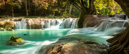 Panoramic exotic  beautiful tropical deep rainforest waterfall  and lake panorama landscapeの写真素材