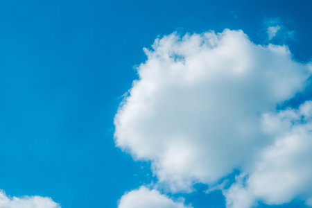 white fluffys clouds sky background with blue sky background for copy spaceの写真素材
