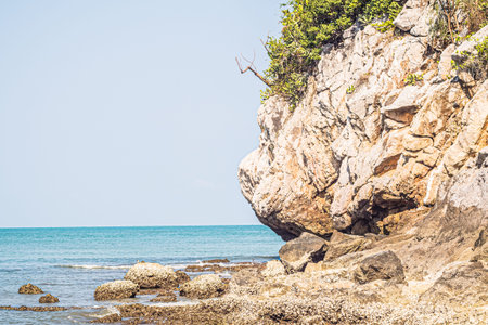 Beach rock horizon scenics Calm sea blue water ocean  blue skyの写真素材