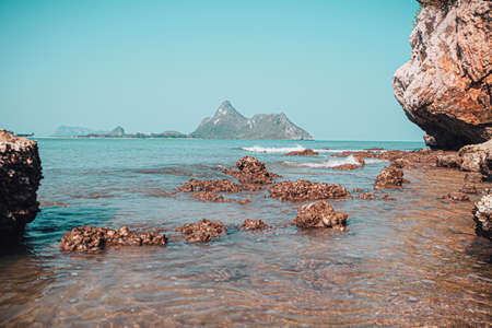 Beach rock horizon scenics Calm sea blue water ocean  blue skyの写真素材