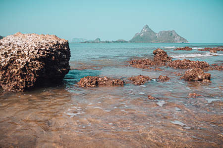 Beach rock horizon scenics Calm sea blue water ocean  blue skyの写真素材