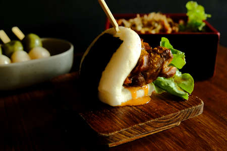 Hirata buns.  Japanese steamed buns filled with pork chashu, tempura, karaage. Japanese traditional foodの写真素材