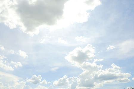 Abstract nature background with clouds in light tonality. White cumulus cloudsの写真素材