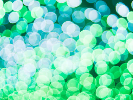 abstract blur green blue tone bokeh on nature defocus nature art backgroundの写真素材