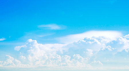 blue Sky white fluffy clouds landscape light backgroundの写真素材