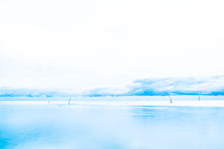 panorama horizntal scenic f blue clouds over sea water in summerの写真素材
