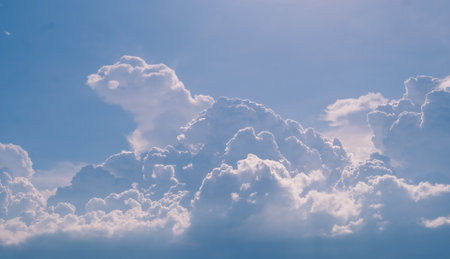 Beautiful white fluffy clouds sky background abstract season and weather.の写真素材