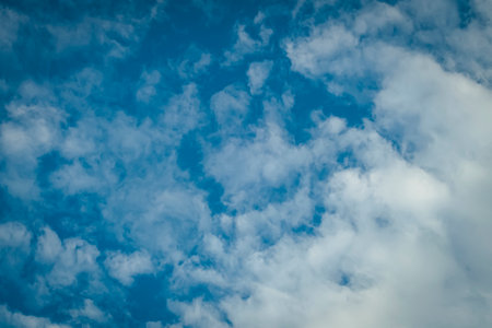 Blue Sky Background With White Clouds. Abstract season weather.の写真素材