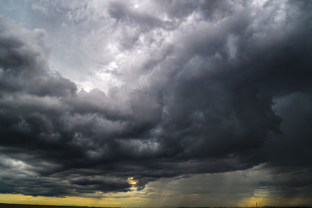 Storm Clouds Over Cold Sea Water. Stylized panoramic seascape. Dramatic sky over sea