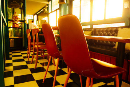 Awaiting Guests: An Empty Morning Seat in an Open CafÃ©の写真素材