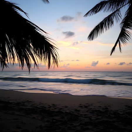 A peaceful beach at sunrise showcasing soft pastel skies and gentle reflections, perfect for serene and tranquil nature compositions.の素材