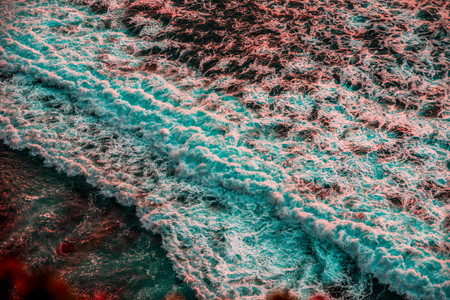 Beautiful photo of powerful ocean breeze at amazing sunset on tropical Bali beachの写真素材