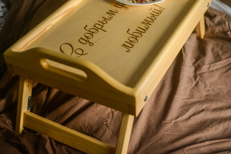 beautiful photo of wood folding breakfast table with the words "good morning, my love!" for gift  in bedの写真素材