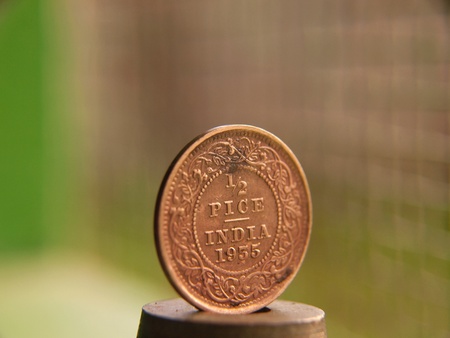 closeup of old indian coinの写真素材