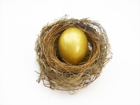 golden egg in nest          の写真素材