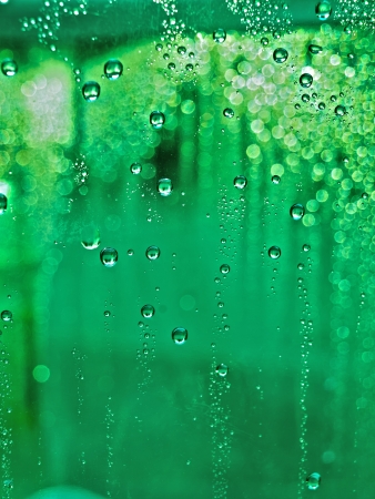 Water drops on window glassの写真素材