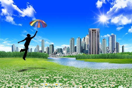 man jumping with umbrellaの写真素材