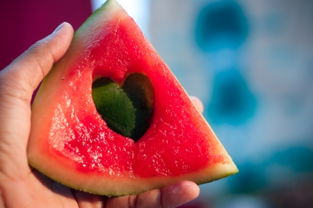 Watermelon cut as heart shapeの写真素材