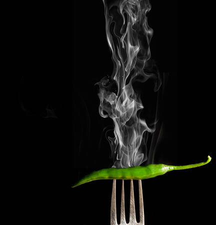 Chilli pepper with smokeの写真素材