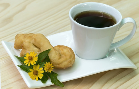 Coffee with deep-fried doughstick breakfastの写真素材