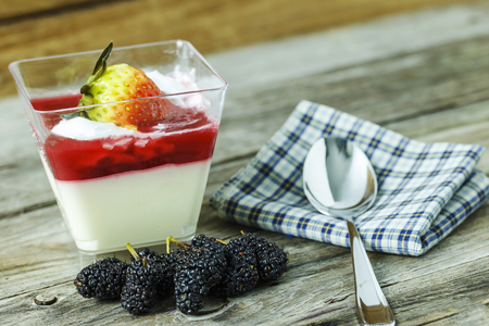 Yogurt Cake with Strawberries on wooden backgroundの写真素材