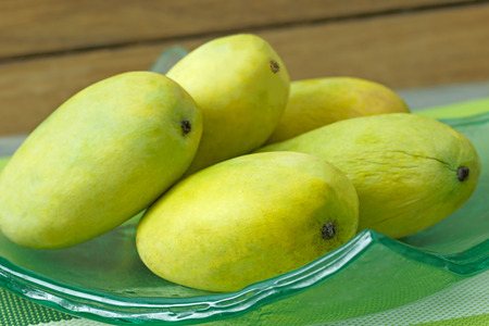 mango on a glass plateの写真素材