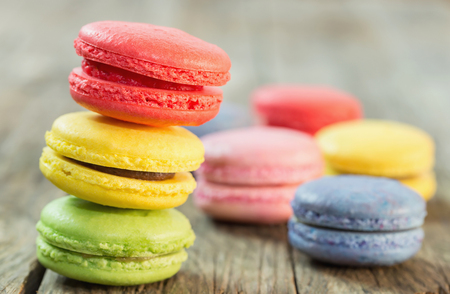 Macaroon colorful on the wooden floorの写真素材