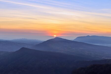 Beautiful sunrise and sky with mountain landscapesの写真素材