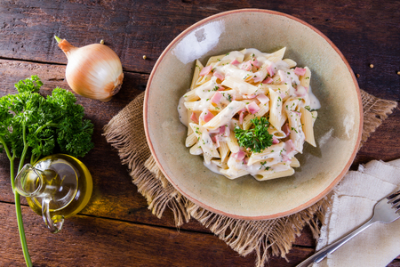 Italian regional pasta  on wooden tableの写真素材
