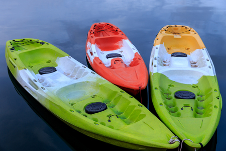 Colorful kayaks on the lakeの写真素材