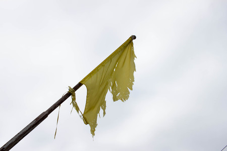 Yellow flag symbol , the lack of wind.の写真素材